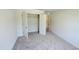 Bright bedroom with closet and plush carpeting, creating a cozy and inviting atmosphere at 147 Gobbler Dr, Smithfield, NC 27577