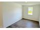 Bedroom featuring wood floors and a single window for ample natural light at 147 Gobbler Dr, Smithfield, NC 27577