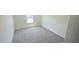 Comfortable bedroom featuring plush carpeting and a window, creating a relaxing and serene environment at 147 Gobbler Dr, Smithfield, NC 27577