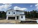 Charming two-story home features a two-car garage and neutral paint at 147 Gobbler Dr, Smithfield, NC 27577