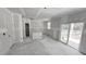 Unfinished kitchen featuring a sliding glass door and natural light at 147 Gobbler Dr, Smithfield, NC 27577