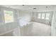 Bright living room featuring fresh drywall, multiple windows, and abundant natural light at 147 Gobbler Dr, Smithfield, NC 27577