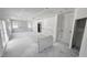 Unfinished living room featuring three large windows and natural light at 147 Gobbler Dr, Smithfield, NC 27577