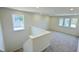 Upstairs loft featuring carpet flooring and multiple windows for a bright space at 147 Gobbler Dr, Smithfield, NC 27577