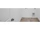 Laundry room with tile flooring and convenient connections for washer and dryer at 174 Hickory Grove Dr, Sanford, NC 27330