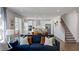 Inviting living space seamlessly connects to the kitchen, featuring an open layout and modern finishes throughout at 174 Hickory Grove Dr, Sanford, NC 27330