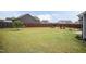 Enjoy outdoor living in this expansive backyard, perfect for entertaining at 18 Fisher Rd, Lillington, NC 27546