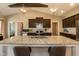 Gourmet kitchen with a large island, stainless steel appliances, and ample cabinet space at 18 Fisher Rd, Lillington, NC 27546