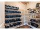 Organized pantry with multiple shelves and storage bins, providing ample space for food items and appliances at 18 Fisher Rd, Lillington, NC 27546