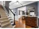 Warm foyer with hardwood floors, staircase, and elegant decor at 1816 Albacore Ln, Raleigh, NC 27612