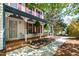 Charming porch with detailed columns, brick flooring, and a welcoming atmosphere at 1816 Albacore Ln, Raleigh, NC 27612