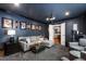 Spacious living room with plush seating, movie projector, and stylish decor at 1816 Albacore Ln, Raleigh, NC 27612