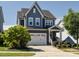 Beautiful two-story home boasts a well-maintained yard and attached two-car garage at 1941 Bright Kannon Way, Wendell, NC 27591
