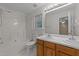 This bathroom features a double vanity, tub-shower combo, and vanity lighting at 205 Smiths Creek Dr, Clayton, NC 27520