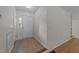 Bright entryway featuring tile flooring and convenient coat closet at 205 Smiths Creek Dr, Clayton, NC 27520