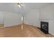 Spacious living room with hardwood floors and fireplace at 205 Smiths Creek Dr, Clayton, NC 27520