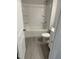 Clean bathroom features a shower over tub and white toilet with tiled flooring at 2118 Terrawood Dr, Durham, NC 27703