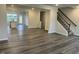 Open-concept living space featuring wood-look floors and an abundance of natural light at 2118 Terrawood Dr, Durham, NC 27703