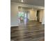 Open-concept living and dining area features hard wood floors and plenty of natural light at 2118 Terrawood Dr, Durham, NC 27703