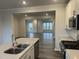 Spacious living room featuring wood-look floors and an abundance of natural light at 2118 Terrawood Dr, Durham, NC 27703