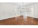 Bright dining room featuring hardwood floors, neutral paint and a chandelier at 2143 Ridge Rd, Raleigh, NC 27607