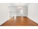 Bright dining room featuring hardwood floors, neutral paint and a chandelier at 2143 Ridge Rd, Raleigh, NC 27607