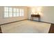 Spacious living room with plantation shutters providing ample natural light at 2143 Ridge Rd, Raleigh, NC 27607