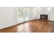 Living room featuring hardwood floors, fireplace and french doors at 2143 Ridge Rd, Raleigh, NC 27607