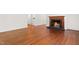 Living room featuring hardwood floors, fireplace and neutral paint at 2143 Ridge Rd, Raleigh, NC 27607