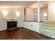 Living room with hardwood floors and brick fireplace at 2143 Ridge Rd, Raleigh, NC 27607