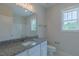 Clean bathroom with granite countertop and great natural light at 24 Sanders Farm Dr, Smithfield, NC 27577