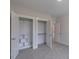 Bedroom view featuring an open closet with built-in shelving at 24 Sanders Farm Dr, Smithfield, NC 27577