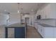 Open kitchen boasts stainless appliances, granite countertops, and a large island perfect for entertaining at 24 Sanders Farm Dr, Smithfield, NC 27577
