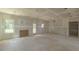 Open-concept featuring a large window and a rear door for convenience at 25 Sanders Farm Dr, Smithfield, NC 27577