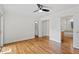 Spacious bedroom with hardwood floors, ensuite bath, and plenty of closet space at 2823 Fowler Ave, Raleigh, NC 27607