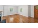 Spacious living area with fireplace and hardwood floors at 2823 Fowler Ave, Raleigh, NC 27607