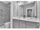 Modern bathroom with double sink vanity, tile flooring and glass shower at 2848 Angelica Rose Way, Apex, NC 27502