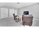 Bonus room featuring comfortable seating and a neutral color palette at 2848 Angelica Rose Way, Apex, NC 27502