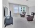 Bonus room featuring comfortable seating and natural light from large windows at 2848 Angelica Rose Way, Apex, NC 27502