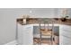 Desk area with granite countertop and plenty of natural light at 2848 Angelica Rose Way, Apex, NC 27502