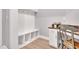 The stylish mudroom features ample storage, a built in bench and a desk area at 2848 Angelica Rose Way, Apex, NC 27502