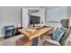 Comfortable home office includes modern workstation and comfortable furniture at 2848 Angelica Rose Way, Apex, NC 27502