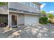 Exterior view of a two-story home featuring an attached garage and a large driveway at 30119 Settle, Chapel Hill, NC 27517