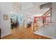 Spacious foyer with hardwood floors leading to the dining room and staircase at 30119 Settle, Chapel Hill, NC 27517