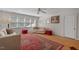 Cozy living room filled with natural light from the window and featuring a large decorative area rug at 30119 Settle, Chapel Hill, NC 27517