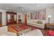 Bright living room featuring a painting, hardwood floors, and stylish furnishings at 30119 Settle, Chapel Hill, NC 27517