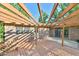 Backyard wooden patio featuring an open pergola, offering outdoor relaxation and entertainment at 308 Rainbow Dr, Carrboro, NC 27510