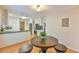 Inviting breakfast nook with kitchen access, a round table, and three chairs at 308 Rainbow Dr, Carrboro, NC 27510