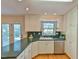 This kitchen features stainless steel appliances, recessed lighting, and a garden view at 308 Rainbow Dr, Carrboro, NC 27510