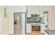 Well-lit kitchen showcases stainless steel appliances, white cabinets, and dark countertops at 308 Rainbow Dr, Carrboro, NC 27510